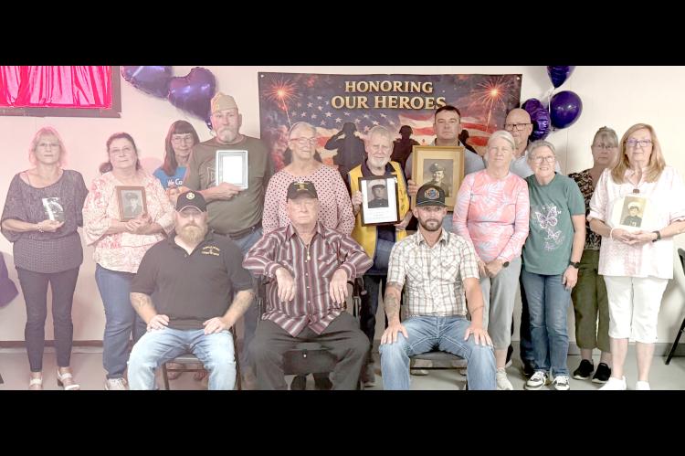 A GROUP OF LOCAL COAL COUNTY PURPLE HEART VETERANS WERE HONORED IN COALGATE RECENTLY...