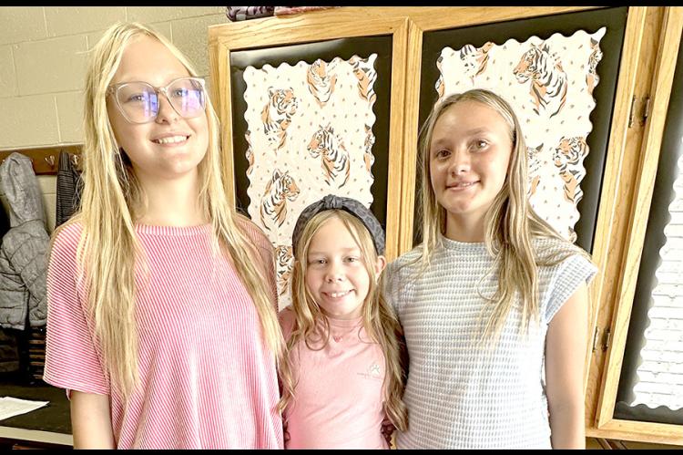 Freshman Serena Marshall, 7th Grader Ellie Campbell and Freshman Dalayna Fortenberry are all smiles for the 2026-2027 School year.