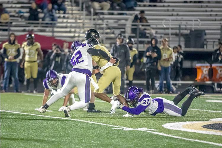 Jett Burris and Rowdy Hemphill combine for the stop against Beggs.