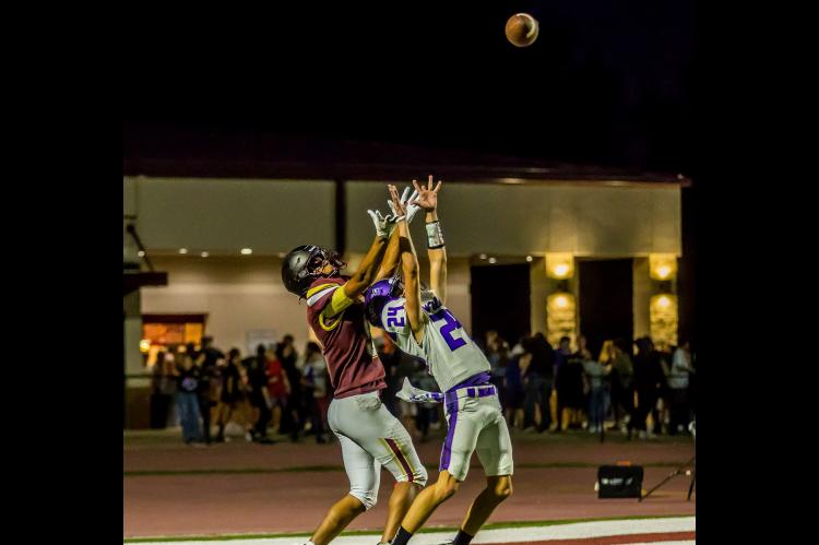 COALGATE FOOTBALL—Kado Pebworth reaches for the sky to pull down a pass. Courtesy of Sherry Loudermilk
