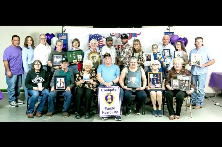 THE CITY OF COALGATE HONORS PURPLE HEART VETERANS, BECOMES PURPLE HEART CITY... Back row: Steve Byrd, State Auditor Cindy Byrd, Allen Leaird, Rachel Nix, June Smith, Sue Swindell, Kenneth Brown, DK Spears, Tammy Hedgecock, Patricia Moore, Donnie Williams, Molly Parker, Aaron Estes Front row: Janet Battles, Bobby Horn, Reba Eddings, Roger Barnes, Tammy Holt, Sandra Stiles, Marla Wellington.