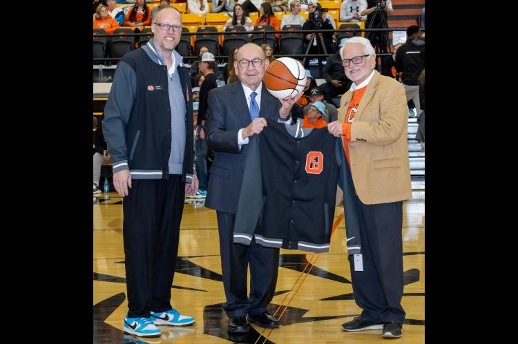 ECU Athletic Director Matt Cole, Chickasaw Nation Governor Bill Anoatubby and ECU President Emeritus John Hargrave, from left, at the 2025 Chickasaw Appreciation Night.