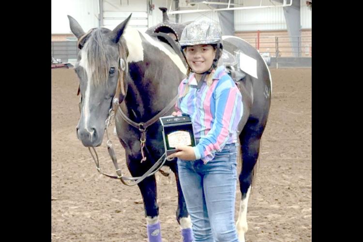 Raylee Winters competed in the Southeast District 4-H horse show representing the Coal County 4-H club. Raylee placed 4th in Ranch Trail division along with 1st place in Barrel Racing, Pole Bending, Flags, and Stakes events. Raylee earned her a spot in the State 4-H Horse Show later in July. Madison Sam is pictured with Raylee.