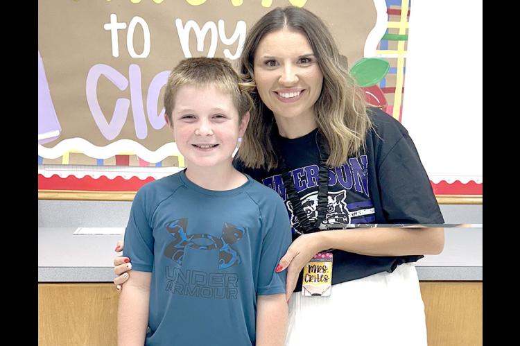 4th Grader Stryker Hensley and Mrs. Crites are all smiles at Meet the Teacher.