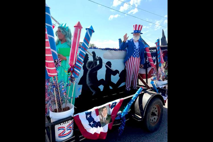 Amy Welch was our beautiful Statue of Liberty and our friend Matt Bowen stepped up to be our “Uncle Sam”. Matt served in the U.S. Navy for 20 years and is always willing to help us! My son, Noah Williams, is represented on this banner. He is currently serving in the Air Force in the east coast.