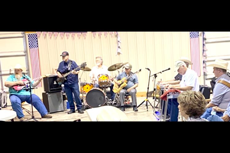 The band that performed at Pake McEntire’s 73rd birthday consisted of Tony Ramsey, drums; Mike Gillam, guitar; Royce Sparks, bass; and Terry Canida, steel guitar. Pictures Courtesy of Johnny D. Ward