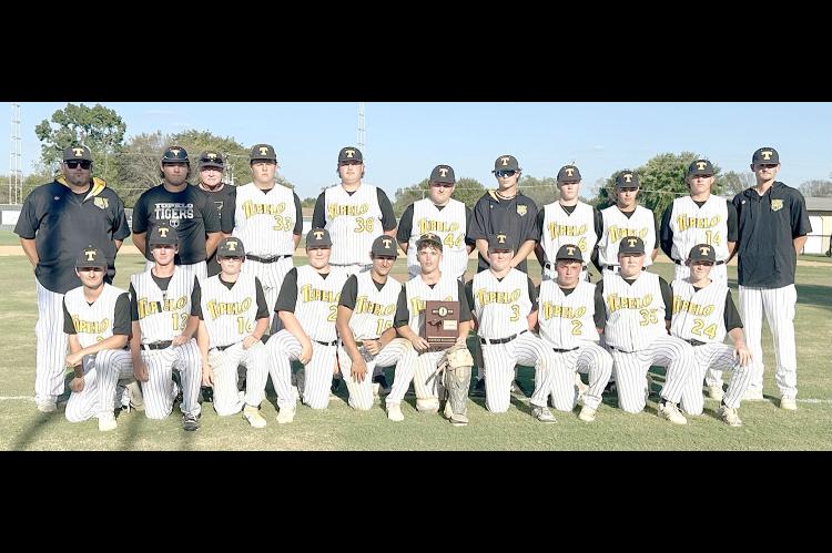 CLASS B DISTRICT CHAMPIONS TUPELO TIGERS. Back row L-R: Coach Romines, Jayden Ellis, Coach Walkup, Dax Young, Jaxon Ellis, Jaxton Fortner, Cal Vick, Bricen Bastible, Ryder Johnson, Brody Horton, and Coach Bills. Front Row L-R: Tegan Davidson, Ben Daniels,