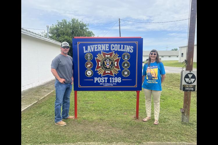 Pictured in front of the new Laverne Collins VFW Post 1198 sign are Tagus Horton of Black Hawk Signs and Janet Airington of VFW Auxiliary.