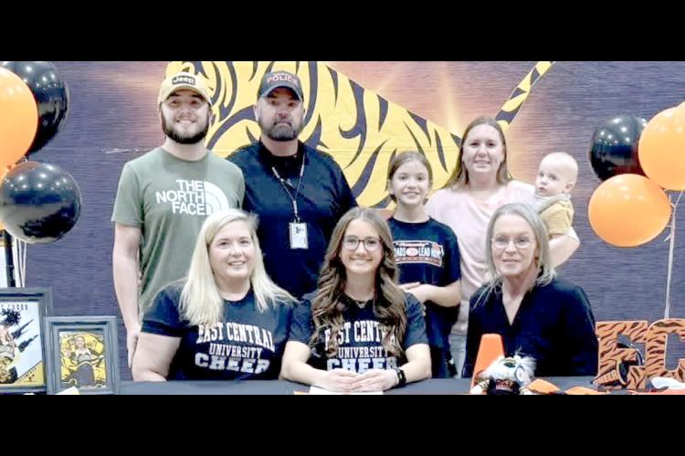 TUPELO SENIOR KEIRA MILLER SIGNED WITH EAST CENTRAL UNIVERSITY CHEERLEADING TEAM. Front row seated - Jennifer Miller, Keira Miller, East Central University Spirit Coordinator: Janesa Miller. Back row - Taylor Miller, Bert Miller, Everly Miller, Jordyn Miller, Calvin Miller.