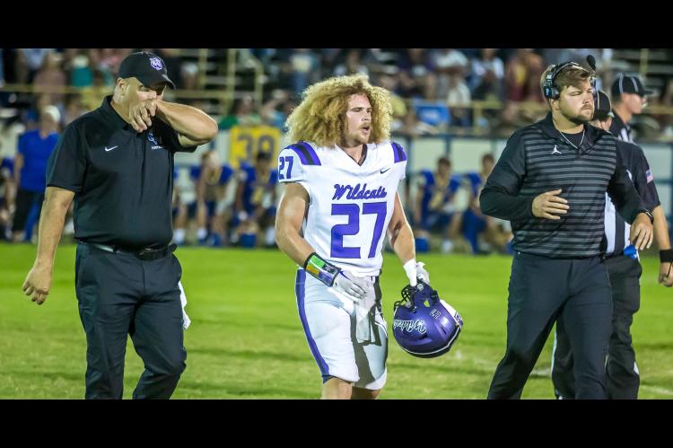 WILDCATS REMAIN UNDEFEATED AFTER THRILLING OVERTIME WIN FRIDAY NIGHT! It was a “hairy” situation Friday night, but Junior Rowdy Hemphill, pictured above with Head Coach Zac Cater (right) and trainer Aaron Blue (left), helped lead the Coalgate Wildcats to a thrilling 28-26 overtime win.