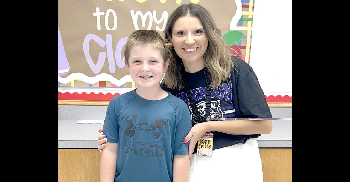 4th Grader Stryker Hensley and Mrs. Crites are all smiles at Meet the Teacher.