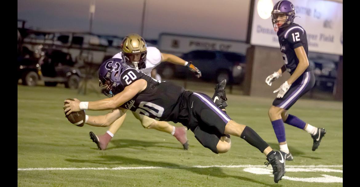 Jett Walkup dives for the touchdown! The score would be crucial to the Wildcat victory over the rival Atoka Wampus cats. The game was decided by only one point. Coalgate Football Pictures by Sherry Loudermilk