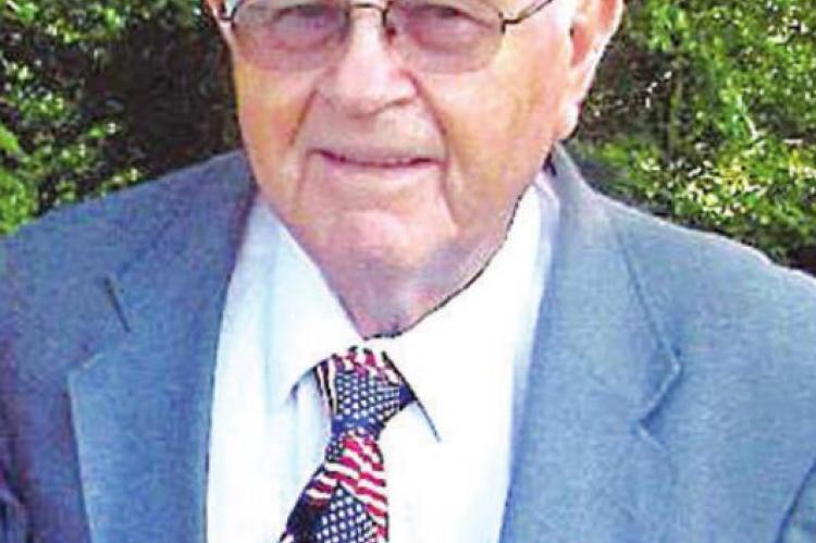 Our Sympathies extended to the families of... John E. Howard