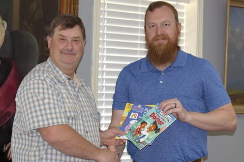 Cottonwood Schools Present New Books to Local Healthcare Facilities