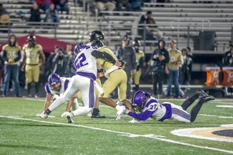 Jett Burris and Rowdy Hemphill combine for the stop against Beggs.