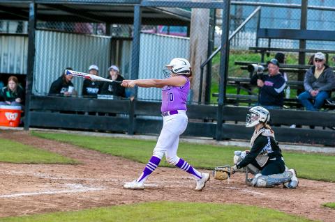 NEVAEH PARKER SWINGS FOR THE FENCES in the Coalgate Lady Wildcats’ 8-5 win over Rattan