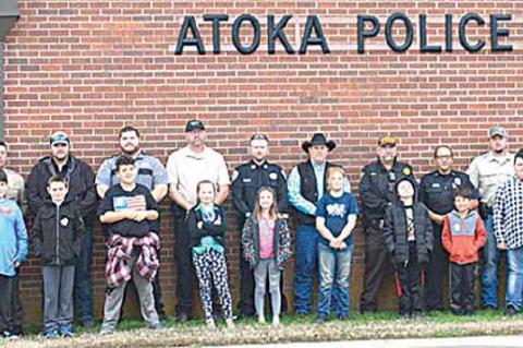 SHOP WITH A COP — Fourteen children partnered up with law enforcement officers from Coal and Atoka Counties on December 14 for the 2019 Shop with a Cop shopping spree.