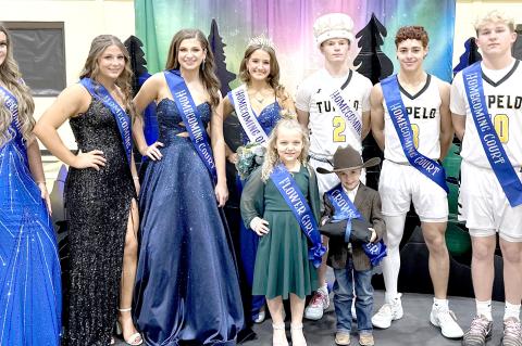 TUPELO HOMECOMING 2025 COURT. Left to Right: Lainee Wafford, Kayle Watson, Liz Sliger, Queen Kierra Miller, King Bricen Bastible, Ryder Johnson, Brody Horton, Aiden Walkup. Flower Girl Kinley Brown, Crown bearer Paycus McCoy-Arterberry.