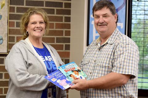 Cottonwood Schools Present New Books to Local Healthcare Facilities