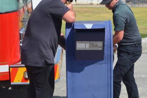 FIREFIGHTERS CAUGHT HACKING MAIL DROP  BOX!