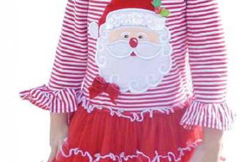 LOOKING BEAUTIFUL IN HER CHRISTMAS DRESS at the Tupelo Christmas Celebration was Everly Miller.