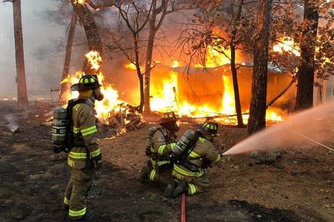 Firefighters battle wildfire east of Coalgate