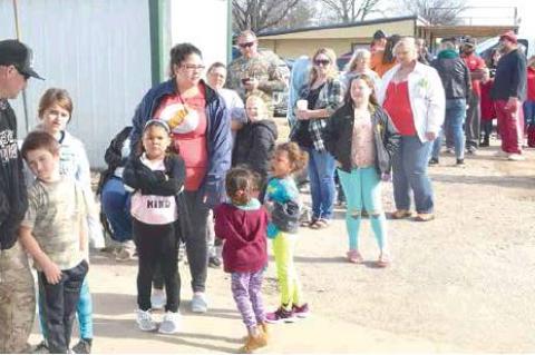 THE LINE WAS LONG TO RECEIVE THEIR GIFTS, BUT IT WAS WORTH THE WAIT!