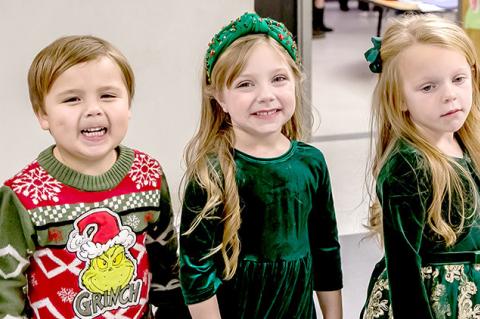 Kayden Ott was so happy to be next to the beautiful Aubrey Smith and Madison Riley at this year’s Christmas party.