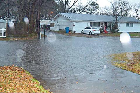 Several streets in Coalgate were closed Friday afternoon and night due to high water. This is S. Byrd St.