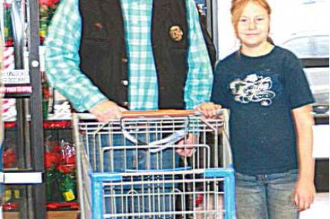 Sheriff Bryan Jump teamed up with Mary Harris for the Shop with a Cop shopping spree.