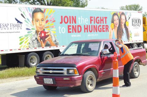 Tupelo hosts Chickasaw Nation Farmers to Families Food Distribution event