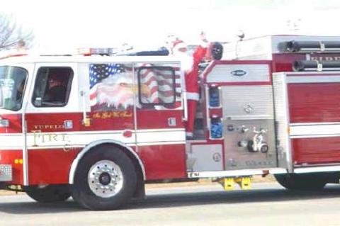 A SPECIAL THANKS TO RICK ELLIS, TUPELO FIRE CHIEF, WHO BROUGHT SANTA CLAUS IN TO TOWN.