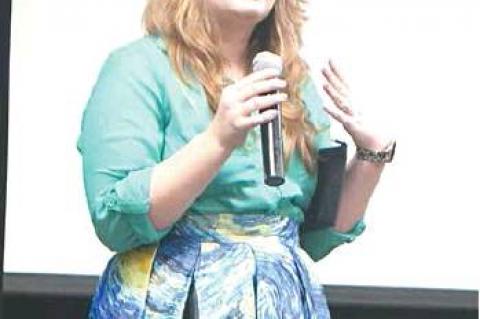 TUPELO ART SHOW — Tupelo Schools art teacher Tonya Crisp welcomes guests to the 2019 art show and auction.