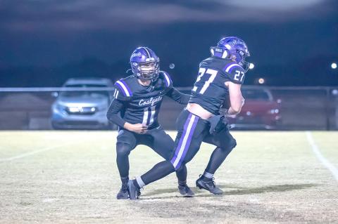Rowdy Hemphill charges through the Dibble defense to move the chains for the Wildcats.